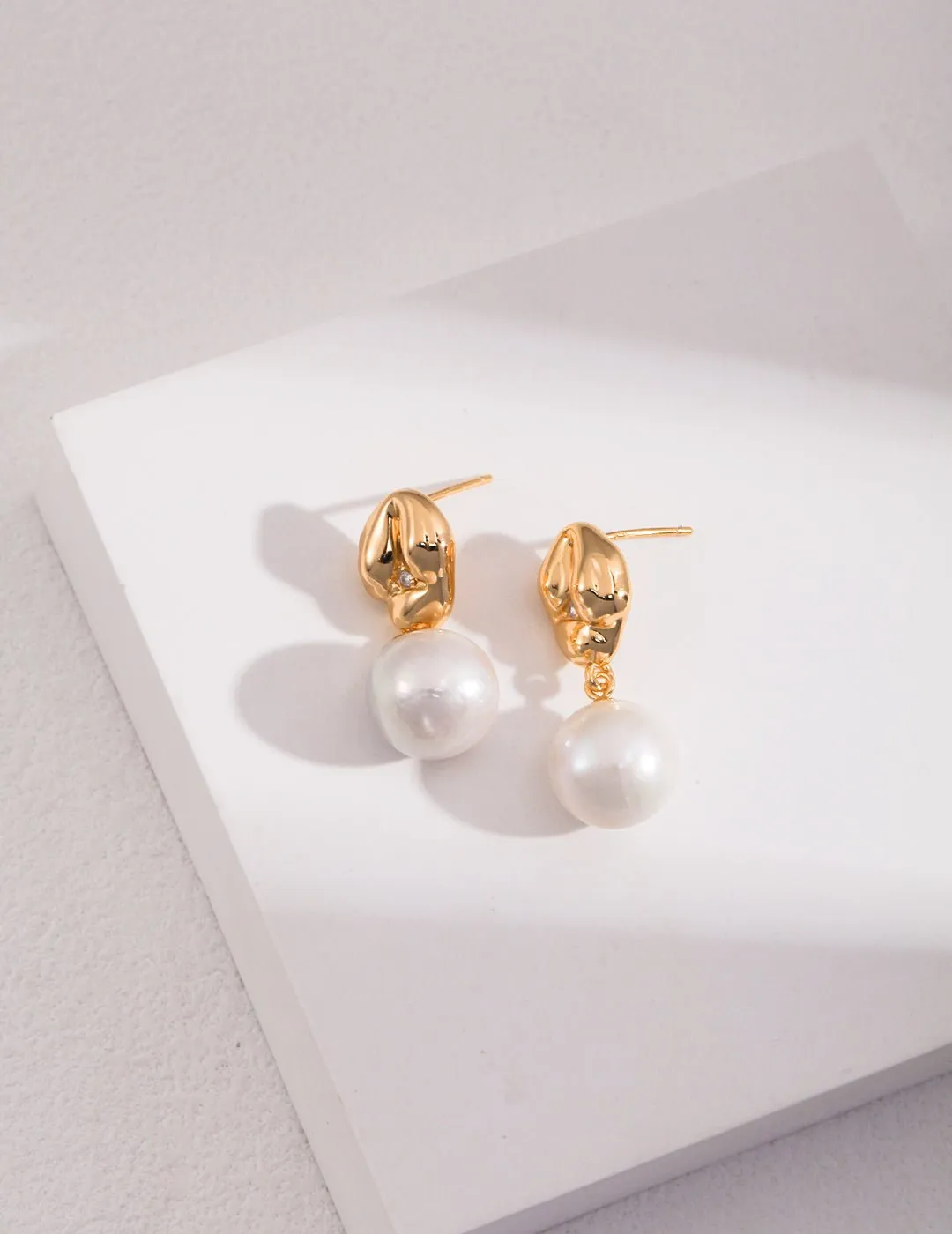 Asymmetrical Textured Pearl Earrings with Zircon Accents