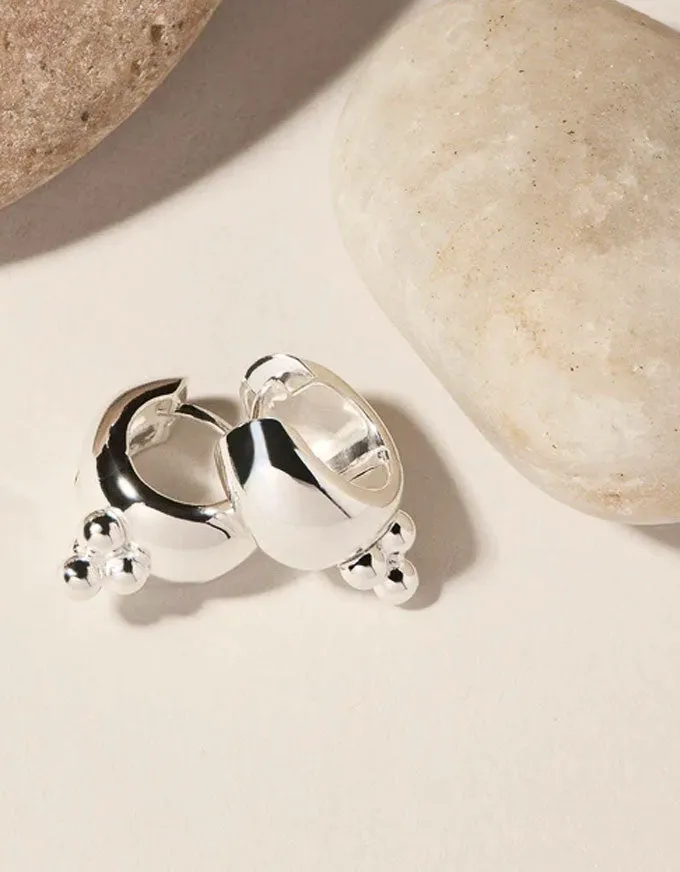 Genie Silver Huggie Earrings