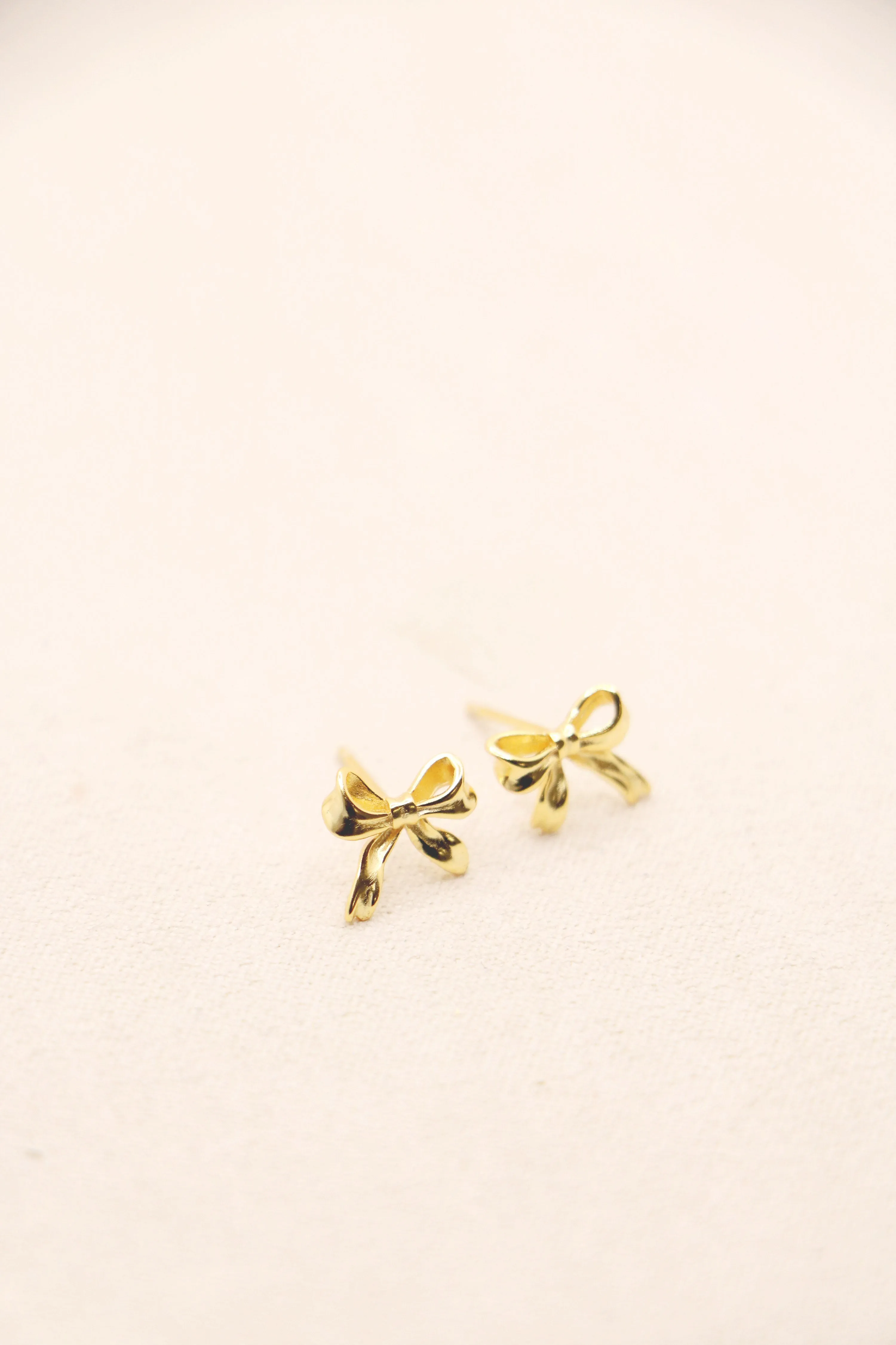 tiny bow studs { silver   gold }