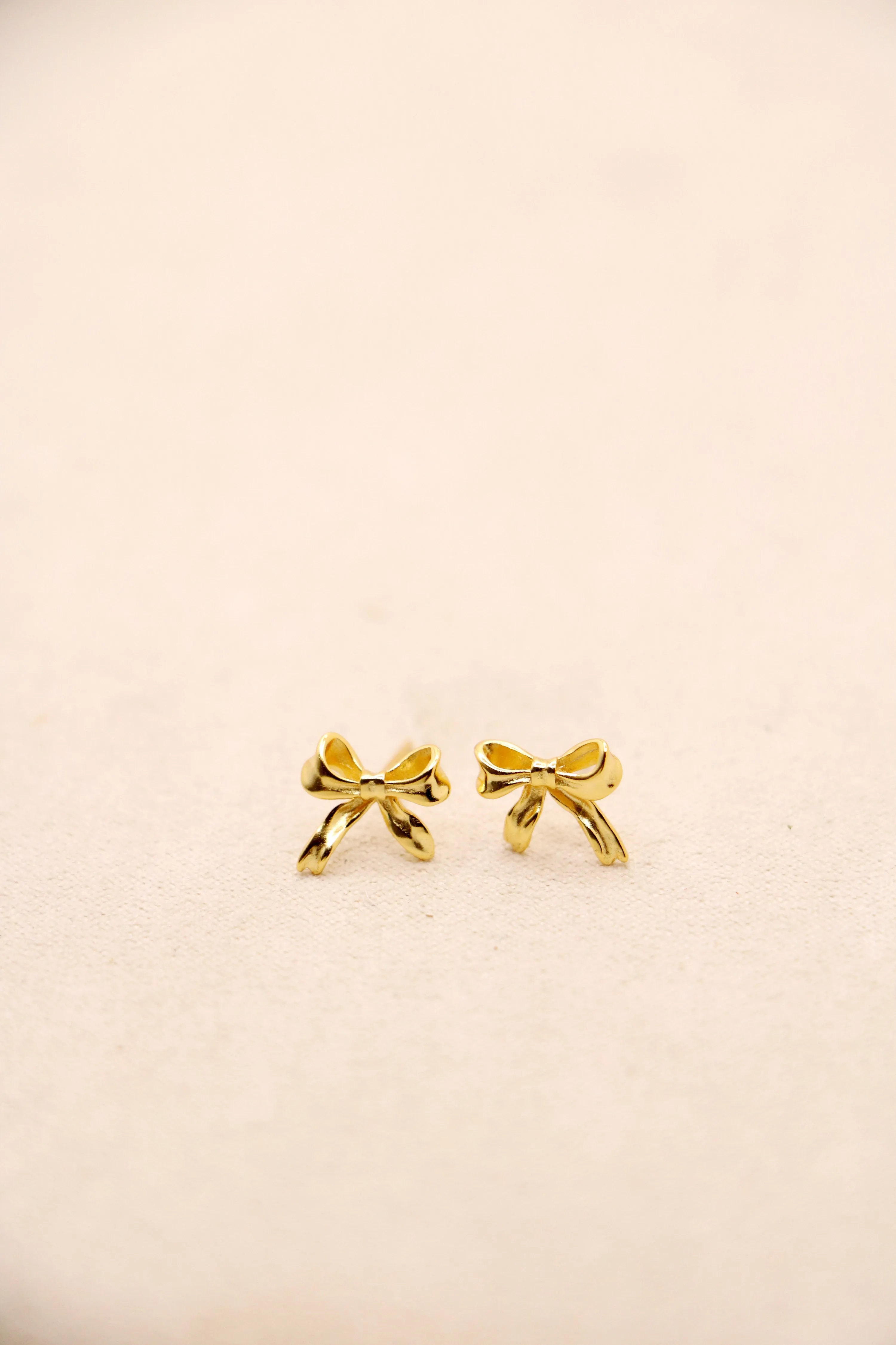 tiny bow studs { silver   gold }