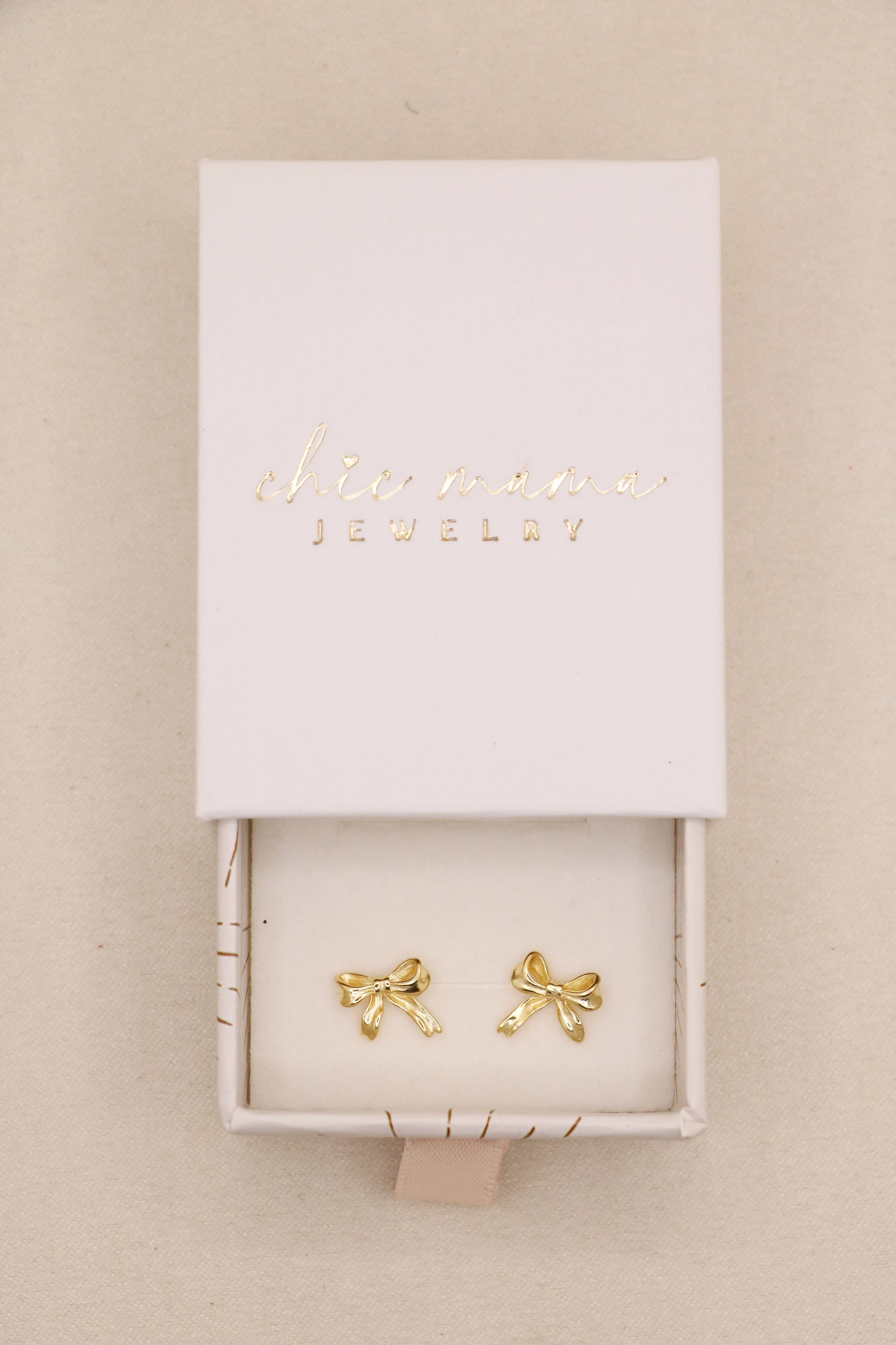 tiny bow studs { silver   gold }